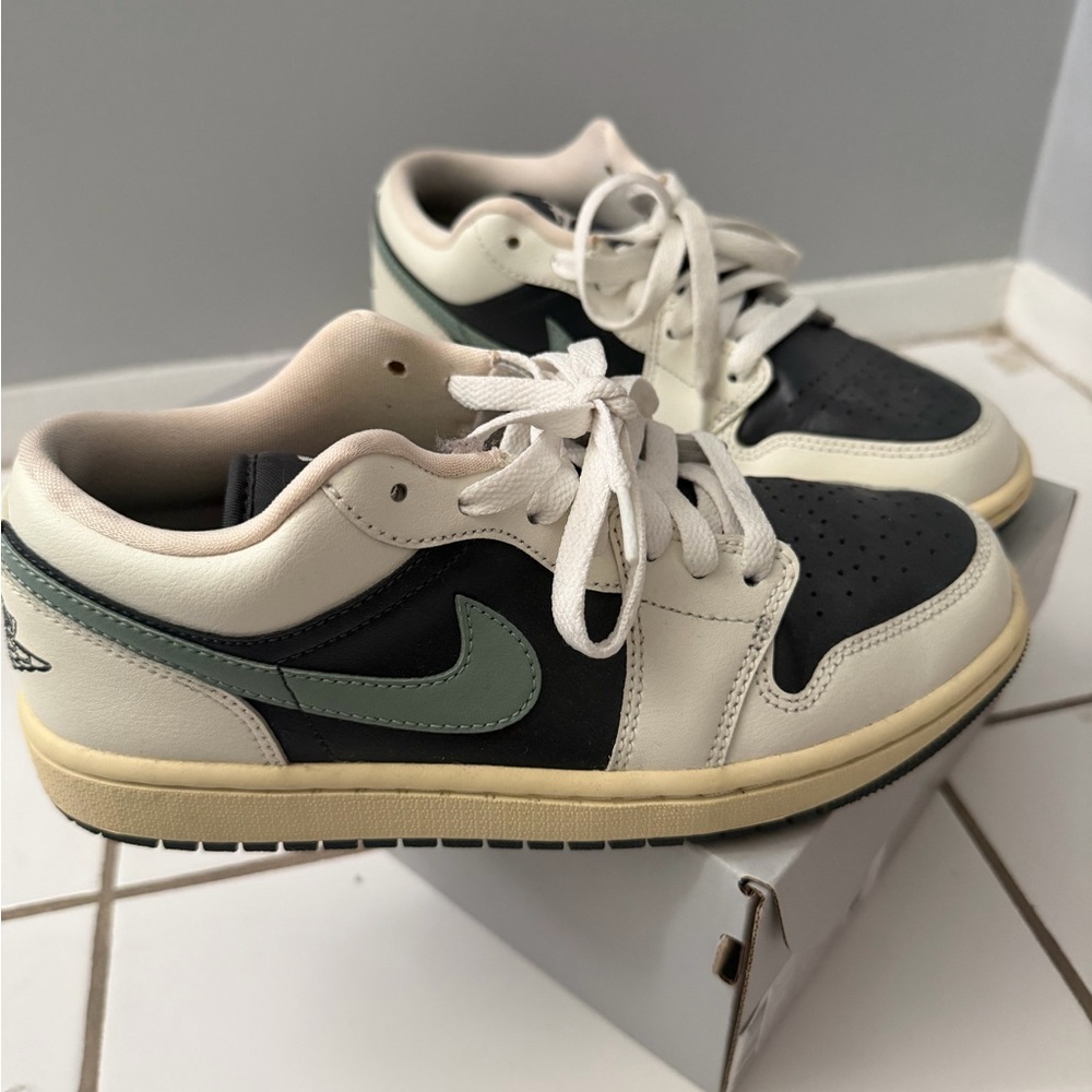 Nike Black and Cream Sneakers with Green Swoosh